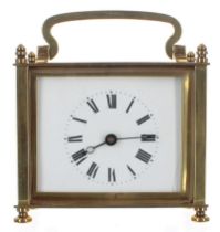 Unusual French carriage clock timepiece with fixed key wind, within a rectangular pillared brass