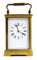 French carriage clock striking on a gong, within a corniche brass case, 6.5" high