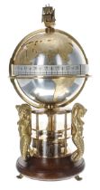 St James House Meridian World Globe Clock circa 1984, the silvered globe with raised gilded