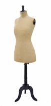 Stockman Paris tailors mannequin, the branded fabric torso raised on an ebonised tripod support, 61"