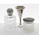 Victorian silver mounted glass scent bottle, the repousse decorated cover enclosing a glass stopper,