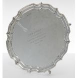 Elizabeth II silver salver, raised on four hoof feet, bearing a presentation inscription to the