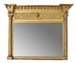 Small Regency style gilded over mantel mirror, the frame flanked by pillars, 31" wide, 25" high (