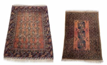 Persian Lori type rug, on a red ground decorated with multiple geometric medallion runs within