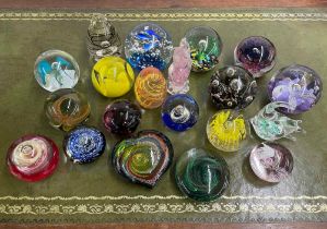 Group of assorted decorative glass paperweights; including by Caithness and Chris Dodds etc.