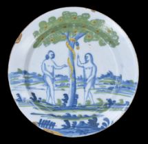 English Delft pottery Adam and Eve plate, possibly Bristol, polychrome decorated with blue figures