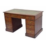 Late 19th century walnut twin-pedestal desk, the top with inset tooled green leather writing surface