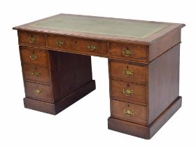 Late 19th century walnut twin-pedestal desk, the top with inset tooled green leather writing surface