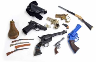 Group of small scale and replica model pistols and rifles; including a Denix Derringer type pistol