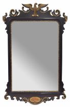 Georgian dark mahogany and parcel gilt fret carved wall mirror, the bevelled glass within a frame