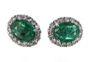 Pair of certificated 18ct white gold oval emerald and diamond cluster stud earrings