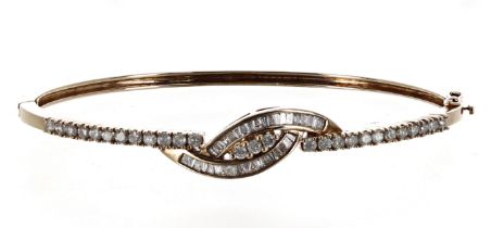 Modern 9ct yellow gold bangle set with baguette and round brilliant-cut diamonds