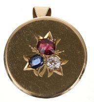 Victorian 18ct yellow gold circular pendant brooch, London 1885, set with a rose-cut ruby, old-cut