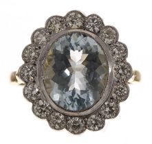 Large and impressive 18ct and platinum aquamarine and diamond oval cluster ring, the aquamarine 3.