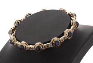 Attractive 9ct yellow gold cabouchon sapphire bracelet, with octagonal links between coloured