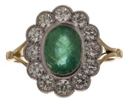 Attractive 18ct and platinum emerald and diamond oval cluster ring, the emerald 1.50ct approx,