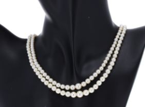 Attractive graduated cultured pearl double strand necklace, the clasp with old-cut diamonds set in