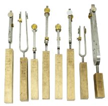 Interesting set of eight French tuneable tuning forks circa 1870, each with a wooden block mount