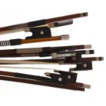 Nickel mounted violoncello bow; also six old nickel mounted violin bows (7)