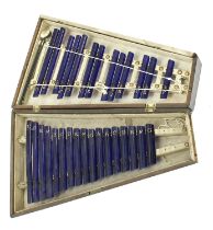 English double xylophone circa 1790, with two separate sets of tuned single blue glass bars, bearing