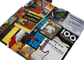 Selection of guitar method books including DVDs