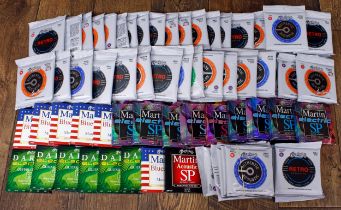 Large quantity of new and sealed Martin acoustic guitar and other strings (internal condition