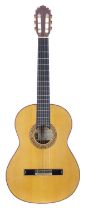 Manuel Rodriguez Model C classical guitar; Back and sides: Indian rosewood, heavy lacquer clouding