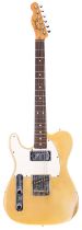 Fender Telecaster left-handed electric guitar, made in USA, circa 1976; Body: yellowed white finish,