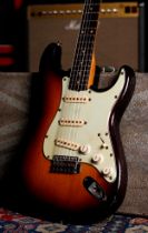 Circa 1960 Fender Stratocaster electric guitar, made in USA; Body: two-tone sunburst refinish, heavy