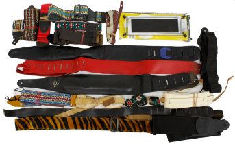 Selection of various vintage fabric and leather guitar straps; together with a Wittner footstool,