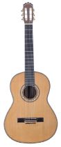 Handcrafted Ramirez style classical guitar; Back and sides: Indian rosewood; Top: natural cedar;