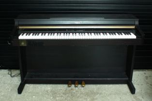 Roland HP103E digital piano *Please note: Gardiner Houlgate do not guarantee the full working