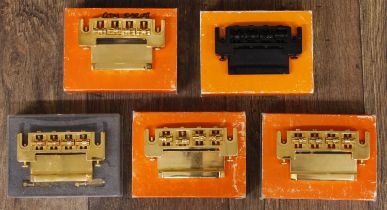 Five various Schaller bass guitar bridge assemblies (5)