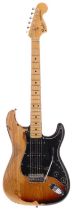 1979 Fender Stratocaster electric guitar, made in USA; Body: heavily worn sunburst finish, wear