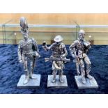 Three Silvered Metal Military Figures, w