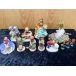 Collection of Goebel Figures, including an 8" figure of a lady with a basket of flower,