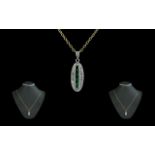 Ladies 18ct White Gold Attractive Diamond and Emerald Set Pendant, Attached to 9ct Gold Fancy Chain.