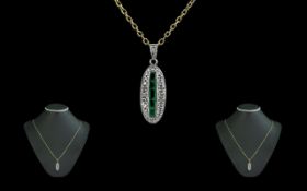 Ladies 18ct White Gold Attractive Diamond and Emerald Set Pendant, Attached to 9ct Gold Fancy Chain.