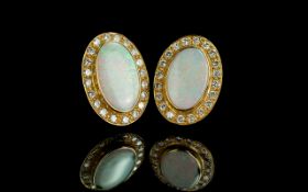 18ct Gold Superb Quality and Impressive Pair of Opal and Diamond Set Earrings. Marked 18ct - 750.