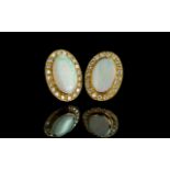 18ct Gold Superb Quality and Impressive Pair of Opal and Diamond Set Earrings. Marked 18ct - 750.