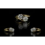 Ladies 18ct Gold Attractive 2 Stone Diamond Set Ring marked 750 to interior of shank.