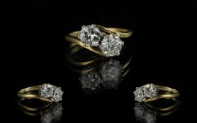 Ladies 18ct Gold Attractive 2 Stone Diamond Set Ring marked 750 to interior of shank.