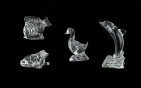 Four Waterford Lead Crystal Clear Glass Figures comprising of a figure of a dolphin 16 cms in