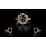 Ladies 18ct Gold Attractive Diamond & Fire Garnet Cluster Ring, flowerhead setting.