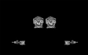 Pair of 18ct White Gold Diamond Stud Earrings, set with princess cut diamonds.