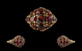 Ladies 9ct Gold Garnet Set Cluster Ring fully hallmarked to interior of shank the well matched