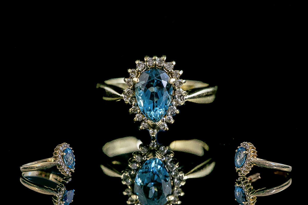 Ladies 9ct Gold Attractive Deep Blue Aquamarine and Diamond Set Ring.