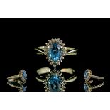 Ladies 9ct Gold Attractive Deep Blue Aquamarine and Diamond Set Ring.