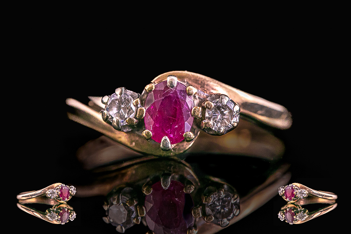 18ct Gold - Attractive 3 Stone Ruby and Diamond Set Ring. Full Hallmark to Shank. Ring Size K.