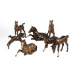 A Collection of 7 Beswick Foals various models to include, model 915 'Foal Lying',